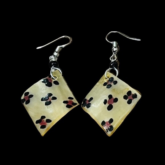 Make Me Shine Jewelry - Handcrafted horn earrings, made in Africa. Benefits charity.